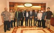 Indonesian UEC alumni and UEC mission members at the entrance of the hotel restaurant